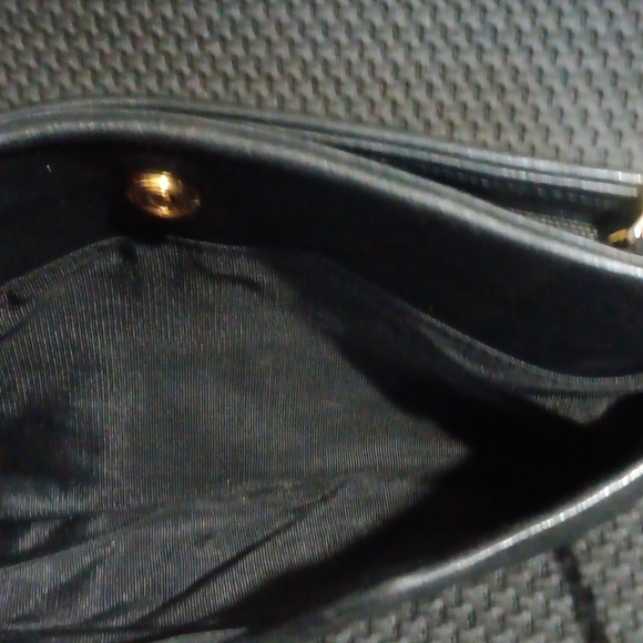 Elegant Black Quilted Crossbody Bag with Gold Accents - Picture 9 of 9